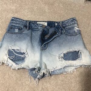 ripped light washed jean shorts